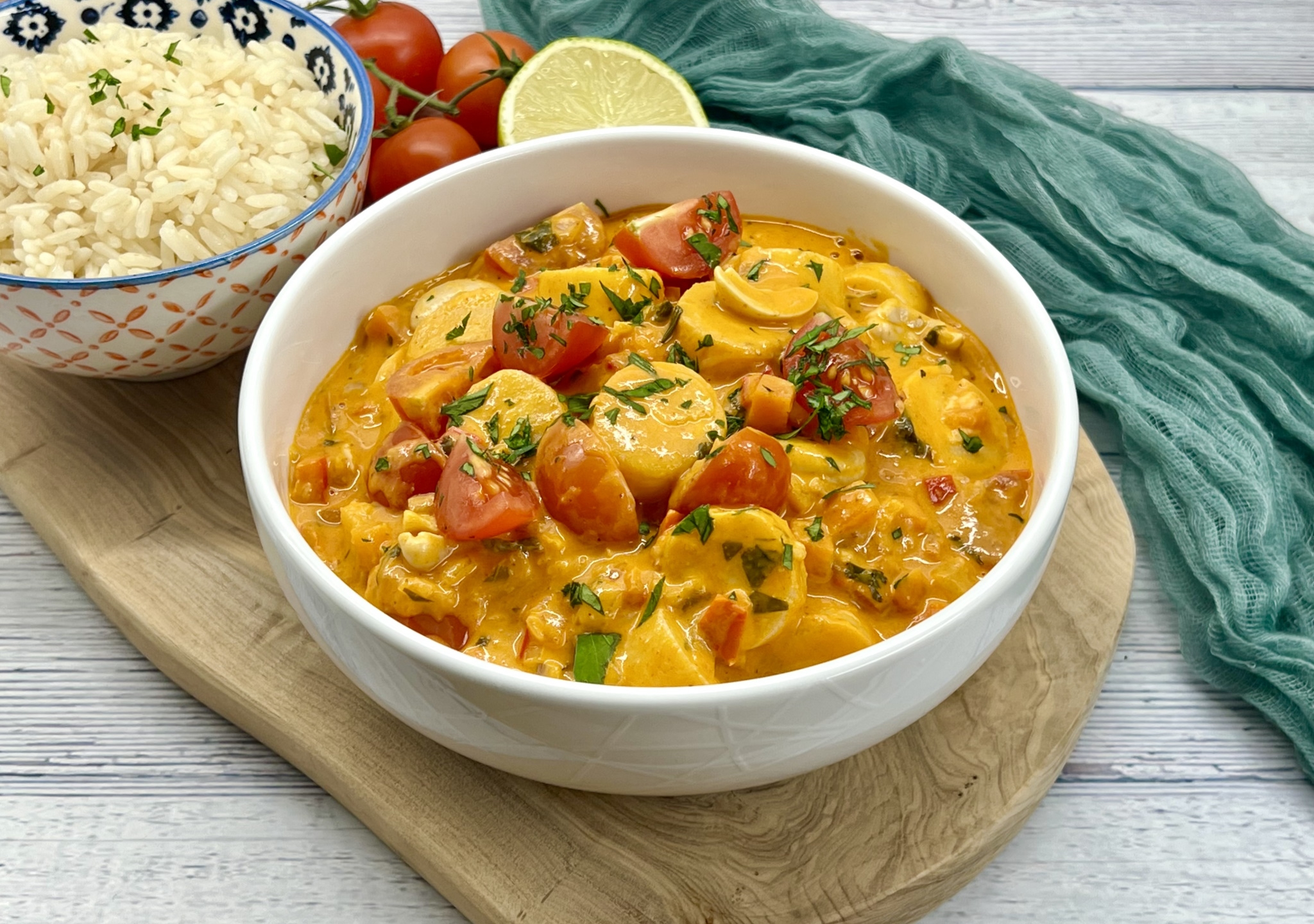 Vegan Moqueca, hearts of palm and vegetables in a spicy and aromatic tomato and coconut sauce.