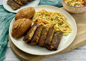 Read more about the article Jamaican Jerk Tofu with Festival Dumplings and Caribbean Coleslaw