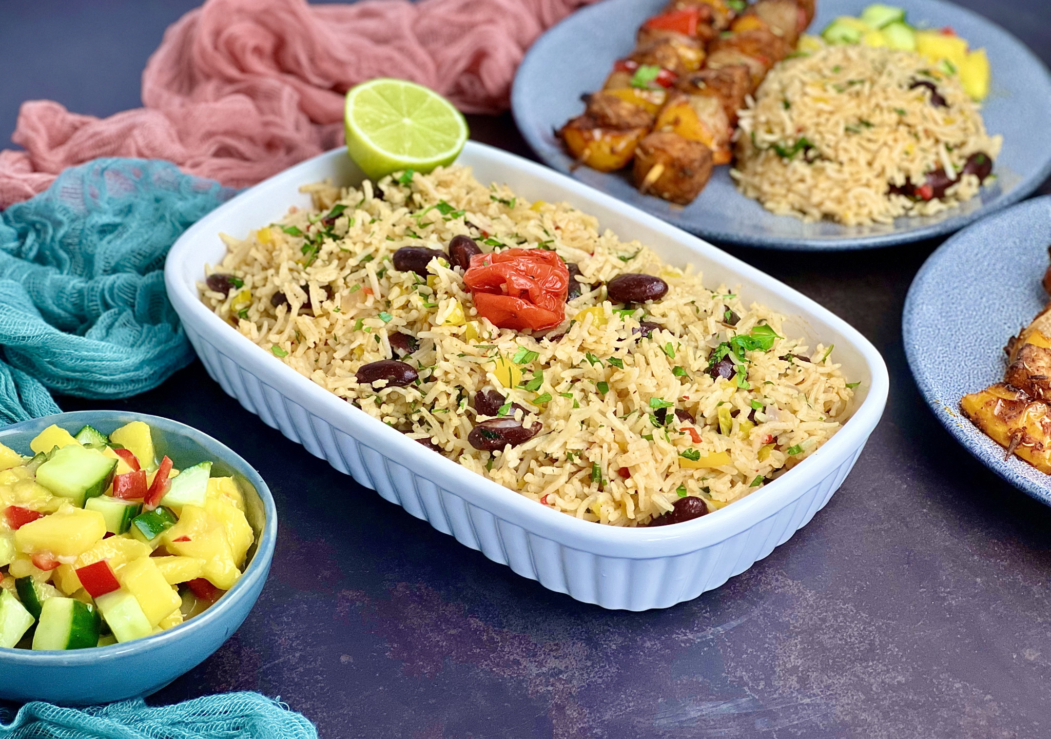 St Lucia style Rice and Bean, a spicy rice side dish cooked in coconut milk with kidney beans. Perfect to serve as a side dish for a Caribbean feast.